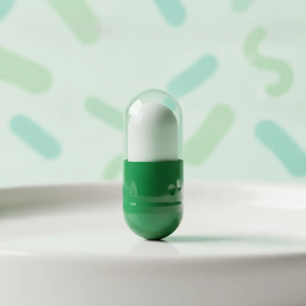 Seed DS-01 ViaCap 2-in-1 capsule with a probiotic capsule nested inside a prebiotic outer capsule